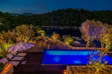 Modern 4-Bedroom Seaside Villa Žrnovo with Pool
