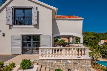 Modern 4-Bedroom Seaside Villa Žrnovo with Pool