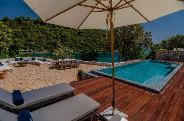 Modern 4-Bedroom Seaside Villa Žrnovo with Pool
