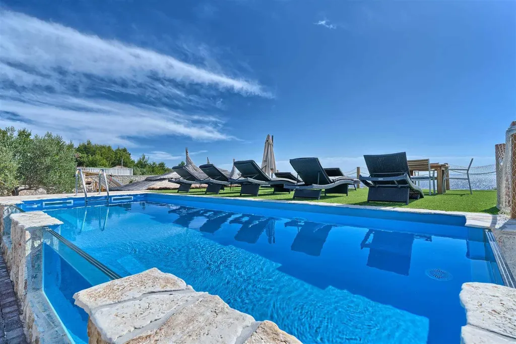 Spacious Beachfront Villa with Pool in Murter