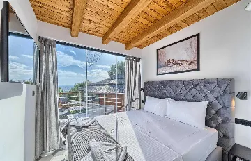 Spacious Beachfront Villa with Pool in Murter