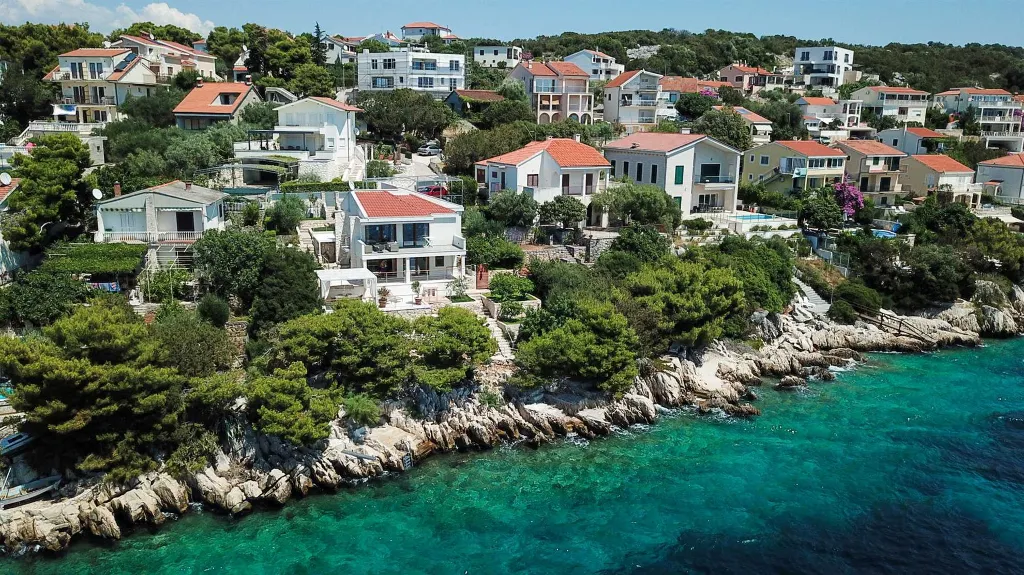 Contemporary Beachfront Villa with Sea Access in Okrug Donji