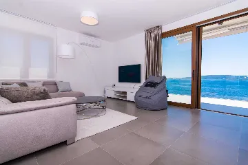 Contemporary Beachfront Villa with Sea Access in Okrug Donji