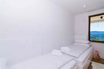 Contemporary Beachfront Villa with Sea Access in Okrug Donji