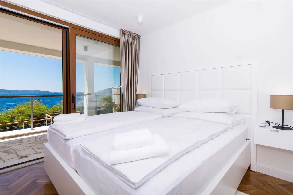 Contemporary Beachfront Villa with Sea Access in Okrug Donji