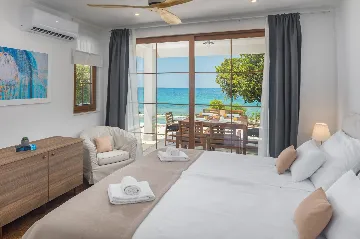 Contemporary Beachfront Villa with Pool in Bale