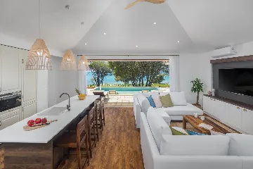 Contemporary Beachfront Villa with Pool in Bale