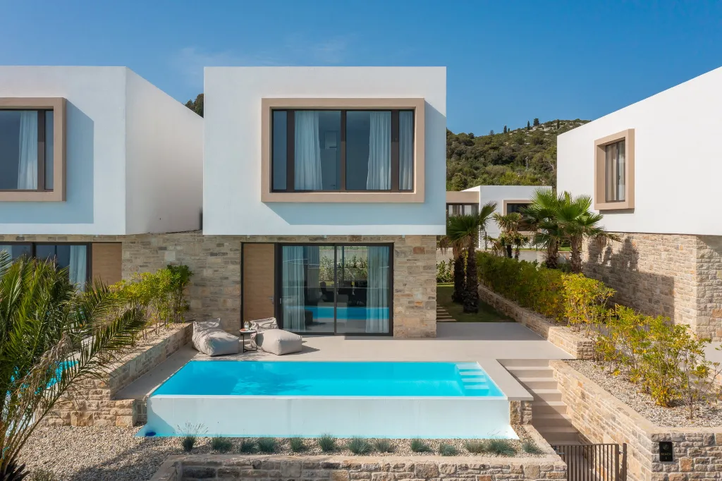 Modern Poolside Villa with Beach Access in Tkon
