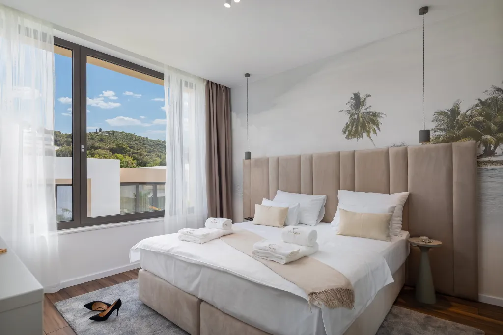 Modern Poolside Villa with Beach Access in Tkon