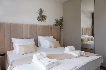 Modern Poolside Villa with Beach Access in Tkon