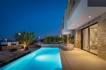 Modern Poolside Villa with Beach Access in Tkon