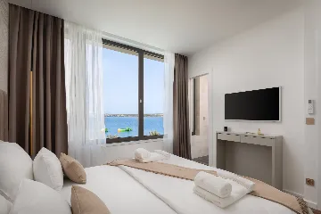 Modern Beachfront Villa with Private Pool in Tkon