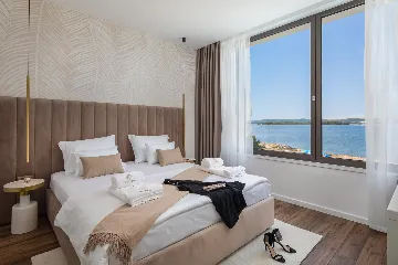 Beachfront Family Villa with Pool in Tkon