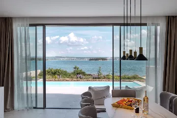 Contemporary Beachfront Villa with Private Pool in Tkon