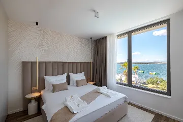 Contemporary Beachfront Villa with Private Pool in Tkon