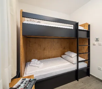 Modern Seaside Apartment with Pool in Okrug Gornji