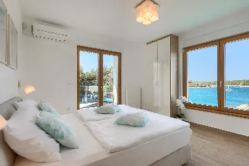 Contemporary Seafront Villa with Infinity Pool, Pula