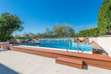 Beachfront Villa with Heated Pool in Mirca