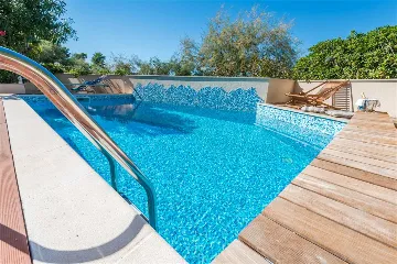 Beachfront Villa with Heated Pool in Mirca