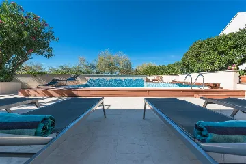 Beachfront Villa with Heated Pool in Mirca