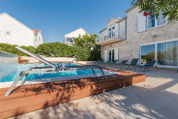 Beachfront Villa with Heated Pool in Mirca