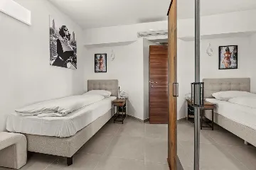 Three-Bedroom Apartment in Vrvari for 6 Guests