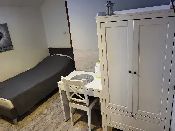 Room with Two Beds and Roof Window in Zagreb