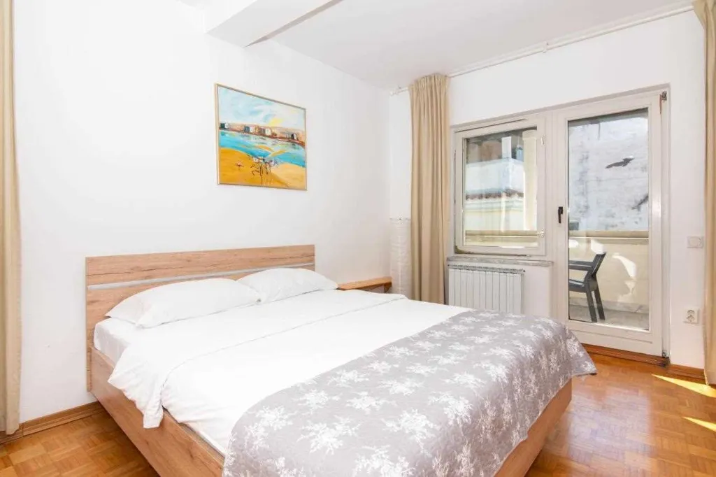 Two-Bedroom Penthouse Apartment with Terrace in Piran