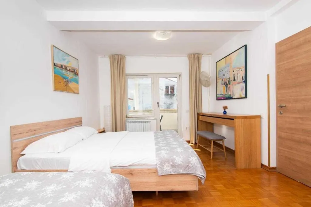 Two-Bedroom Penthouse Apartment with Terrace in Piran