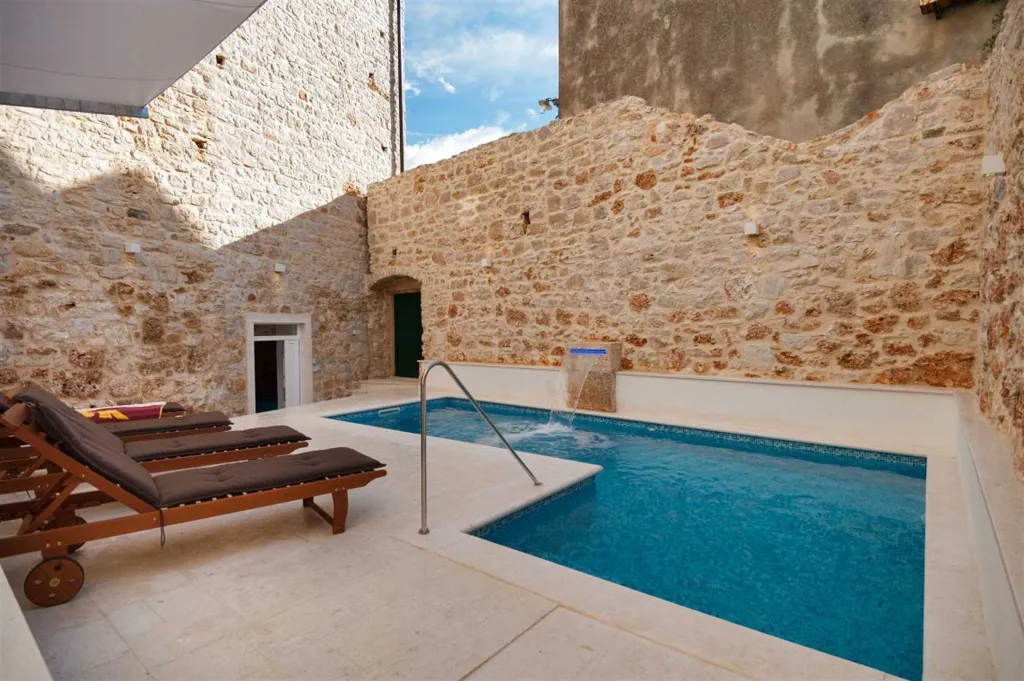 Villa in Bol with Pool, Jacuzzi & Sauna