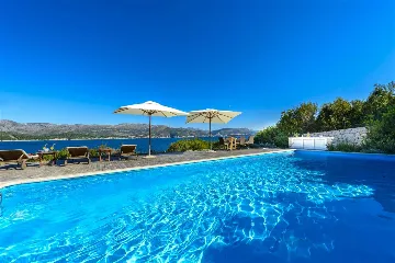 Villa with Outdoor Pool & Private Beach in Koločep