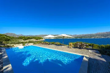 Villa with Outdoor Pool & Private Beach in Koločep