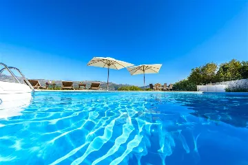 Villa with Outdoor Pool & Private Beach in Koločep