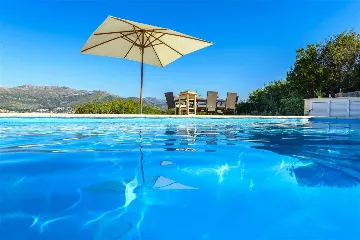 Villa with Outdoor Pool & Private Beach in Koločep