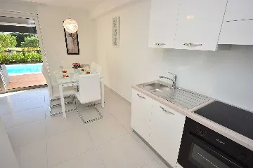 Two-Bedroom Apartment in Turanj with Pool Terrace