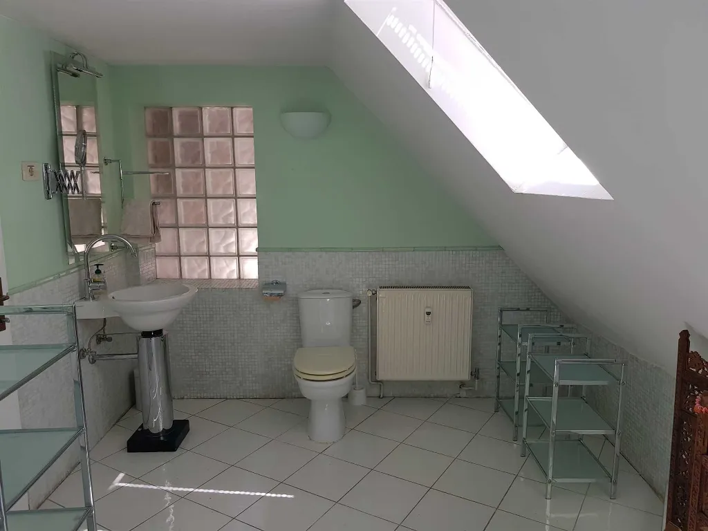 Two-Bedroom Apartment with River Views in Ljubljana