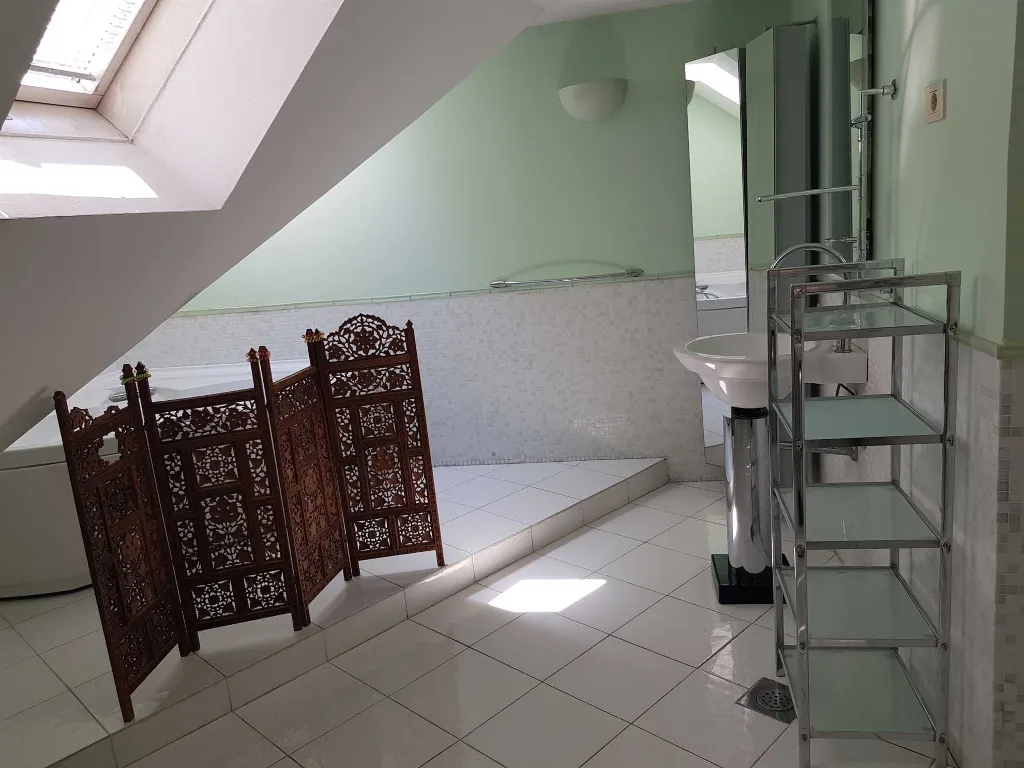 Two-Bedroom Apartment with River Views in Ljubljana