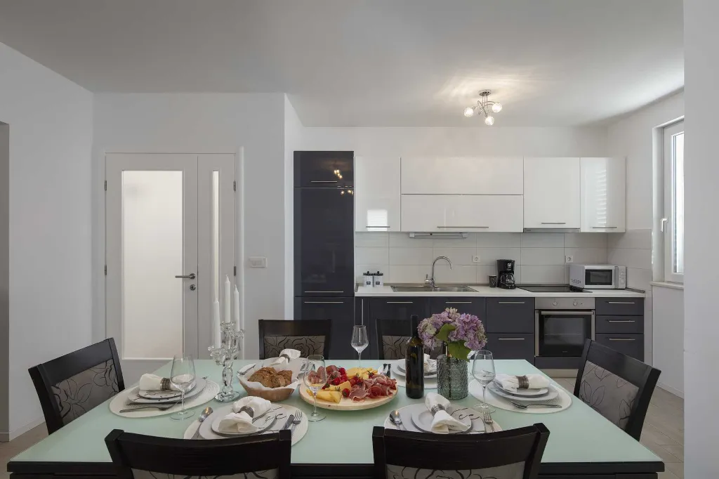 Podstrana Beachfront Apartment with Private Cove