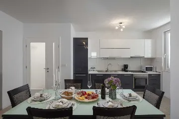 Podstrana Beachfront Apartment with Private Cove