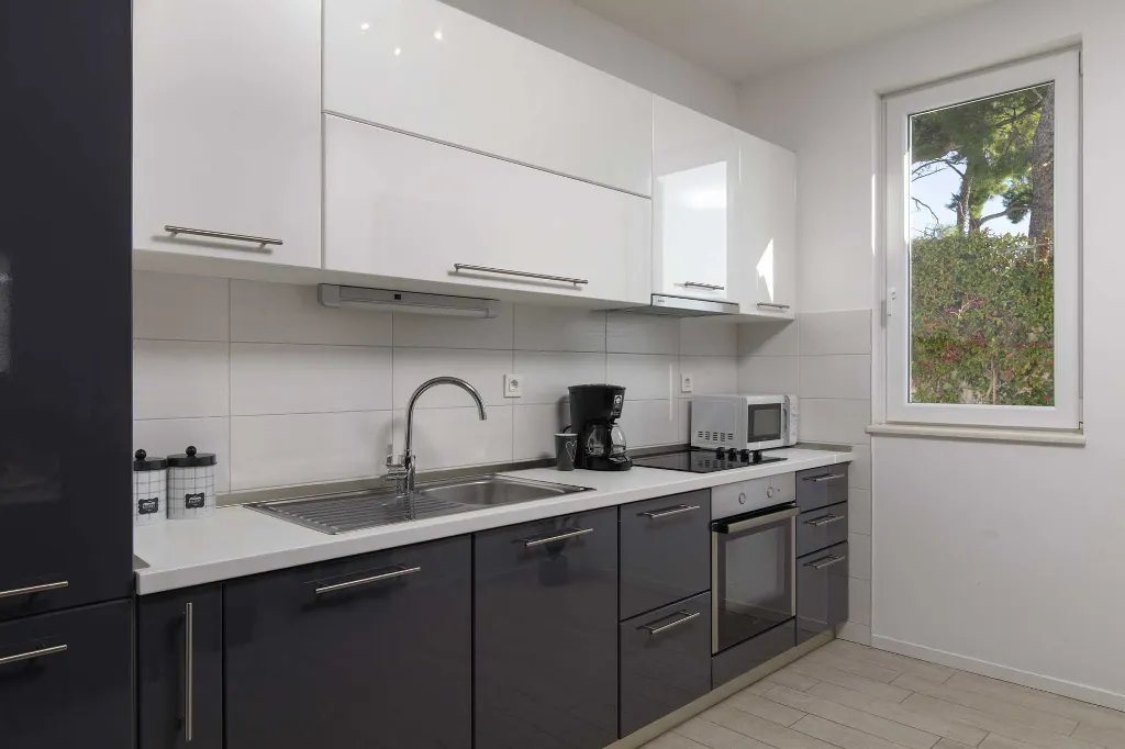 Podstrana Beachfront Apartment with Private Cove