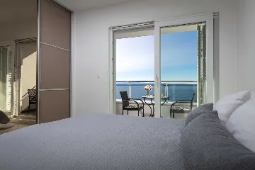 Podstrana Beachfront Apartment with Private Cove