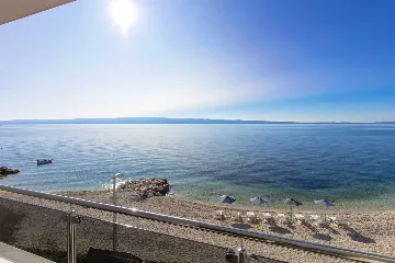 Podstrana Beachfront Apartment with Private Cove