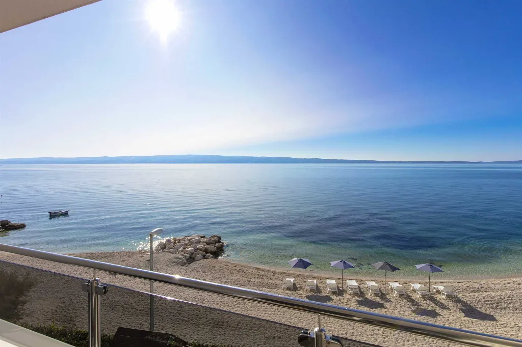 Podstrana Beachfront Apartment with Private Cove