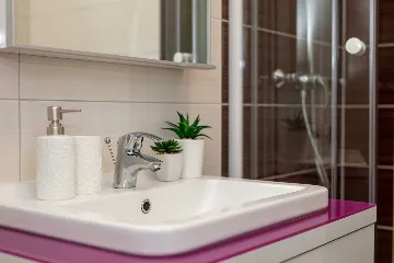 Podstrana Beachfront Apartment with Private Cove