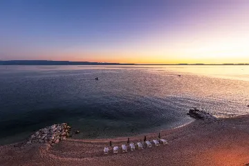 Podstrana Beachfront Apartment with Private Cove