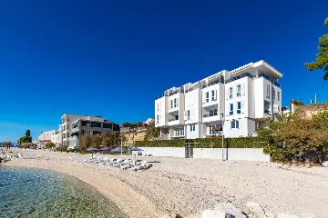 Podstrana Beachfront Apartment with Private Cove