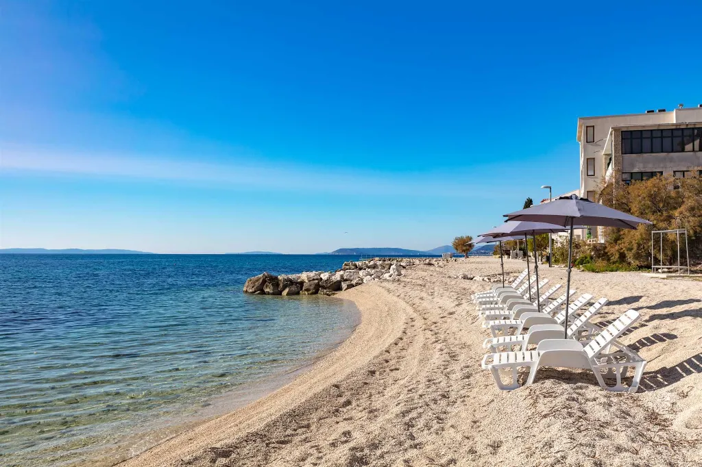 Podstrana Beachfront Apartment with Private Cove