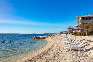 Podstrana Beachfront Apartment with Private Cove