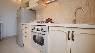 Holiday House in Kaštel Novi with Pool for 10 Guests