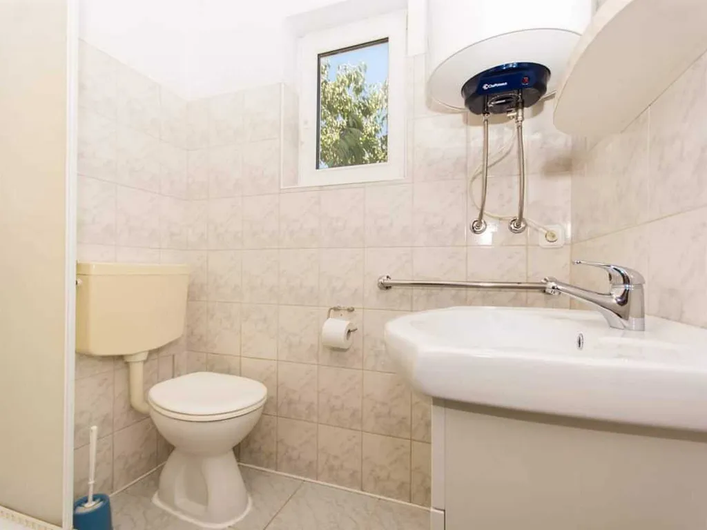 Two-Bedroom Apartment in Okrug Donji with Sea View Balcony